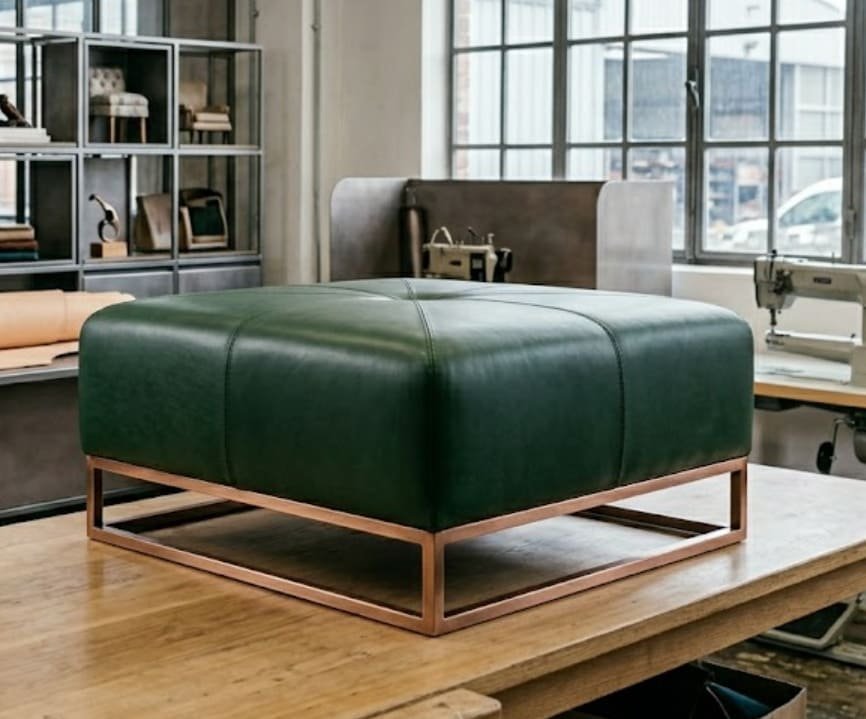 дизайнерський шкіряний пуф на металевому каркасі